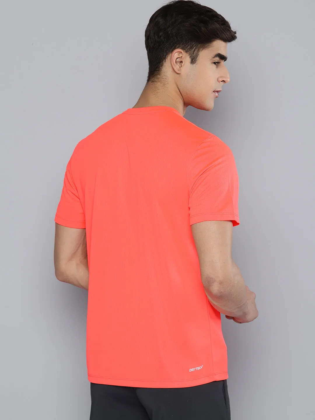 Alcis Men Coral Orange Brand Logo Printed Dry Tech T-shirt
