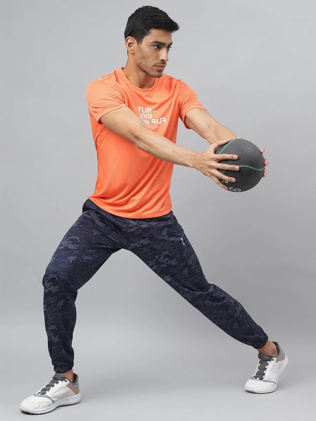 Alcis Men Printed Orange Anti-Static Slim-Fit Round Neck Training T-Shirt